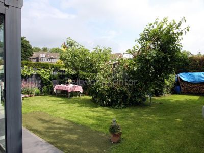Große verglaste Terrasse, Kaminofen,  Garten, hochwertig u. schick möbl., ruhig und grün, gut angebunden.