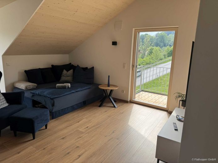 Moderne, stilvoll eingerichtete Wohnung im Dachgeschoss am Ortsrand von Glonn