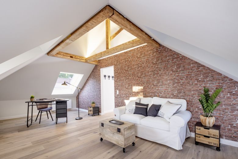 Loft-Style – 2-Zimmer Apartment mit offenem Dachgebälk