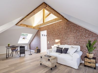 Loft-Style – 2-Zimmer Apartment mit offenem Dachgebälk