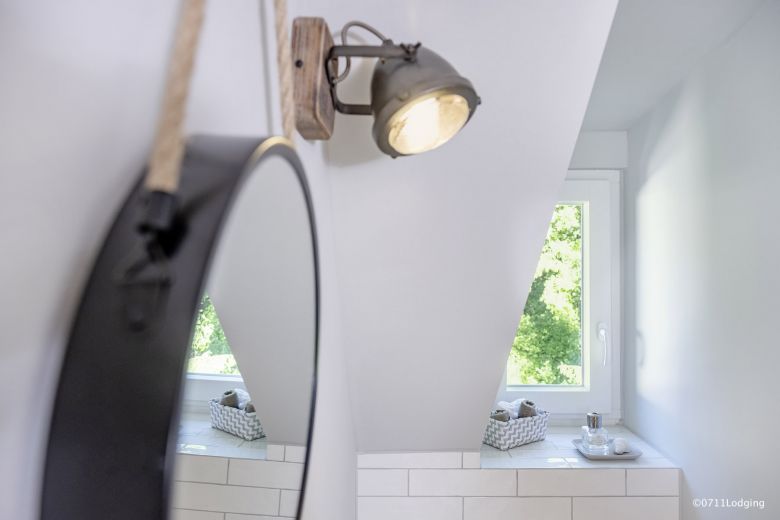 Loft-Style – 2-Zimmer Apartment mit offenem Dachgebälk