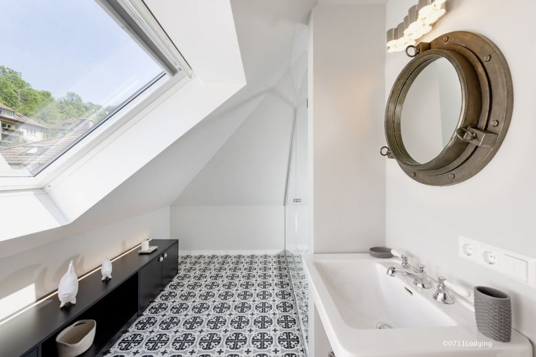 Loft-Style – 2-Zimmer Apartment mit offenem Dachgebälk