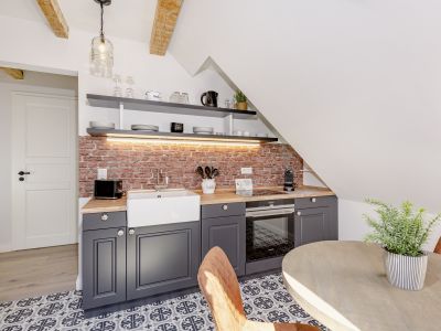 Loft-Style – 2-Zimmer Apartment mit offenem Dachgebälk