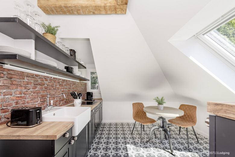 Loft-Style – 2-Zimmer Apartment mit offenem Dachgebälk