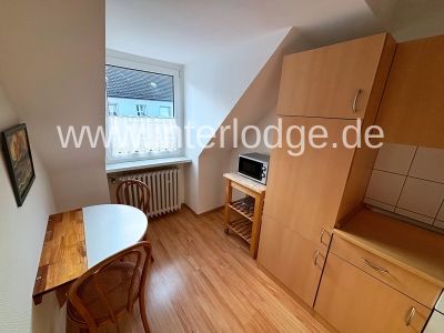 INTERLODGE Neu möblierte Dachgeschosswohnung in Essen-Rüttenscheid, Wohnzimmer.