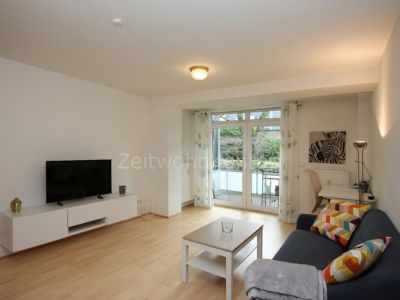 Schick modern, ruhig und zentral, mit Balkon und Garten!