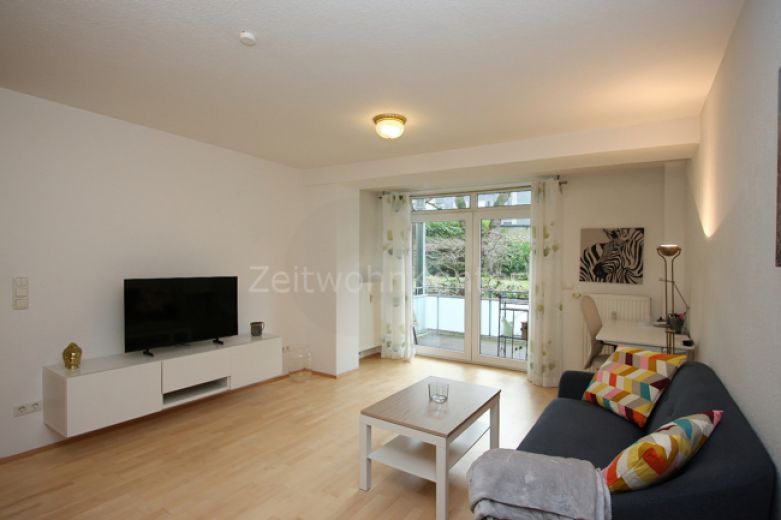 Schick modern, ruhig und zentral, mit Balkon und Garten!