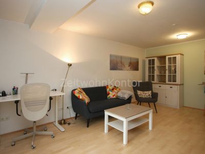 Schick modern, ruhig und zentral, mit Balkon und Garten!