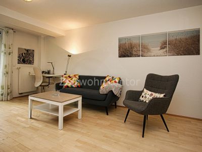 Schick modern, ruhig und zentral, mit Balkon und Garten!