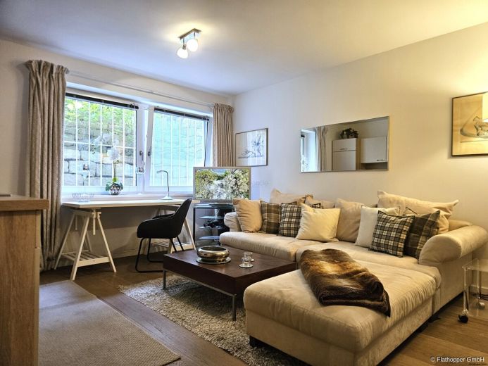 Helles Souterrain-Apartment in einer eleganten Neubauvilla mit Garten in M&uuml;nchen - Sendling