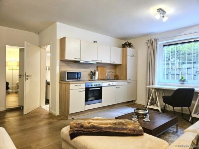 Helles Souterrain-Apartment in einer eleganten Neubauvilla mit Garten in M&uuml;nchen - Sendling