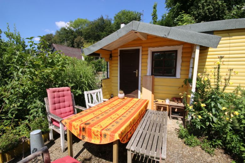 AbacO: Behaglich m&ouml;blierte Wohnung mit Treppchen zum Garten