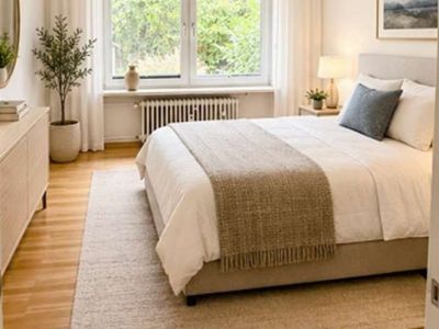 Niederkassel: 4,5- Zimmer-Garten-Wohnung mit 2 Garagenstellpl&auml;tzen in Premiumlage